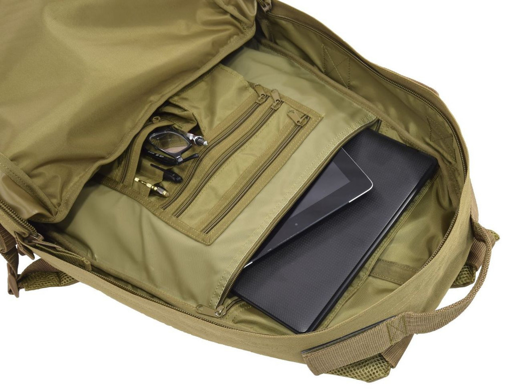 Interior view of the Pecos Tactical Backpack in Coyote Brown showing the large zippered pocket with divider in organizer panel that can hold a tablet and laptop.
