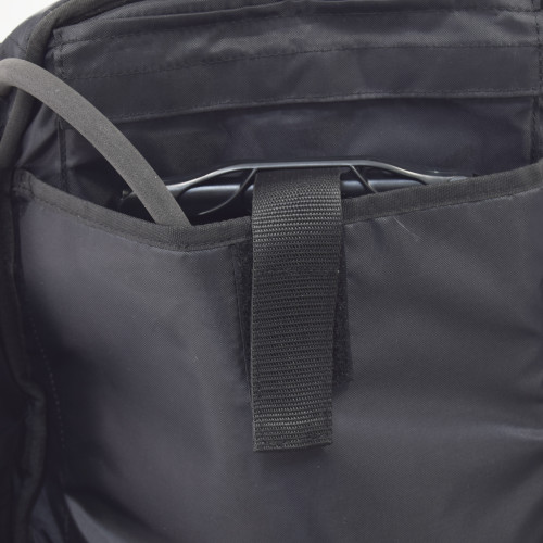 Hydration pouch accommodates up to a 3 liter hydration system, shown with reservoir inside Brazos Concealed Carry Backpack in black.
