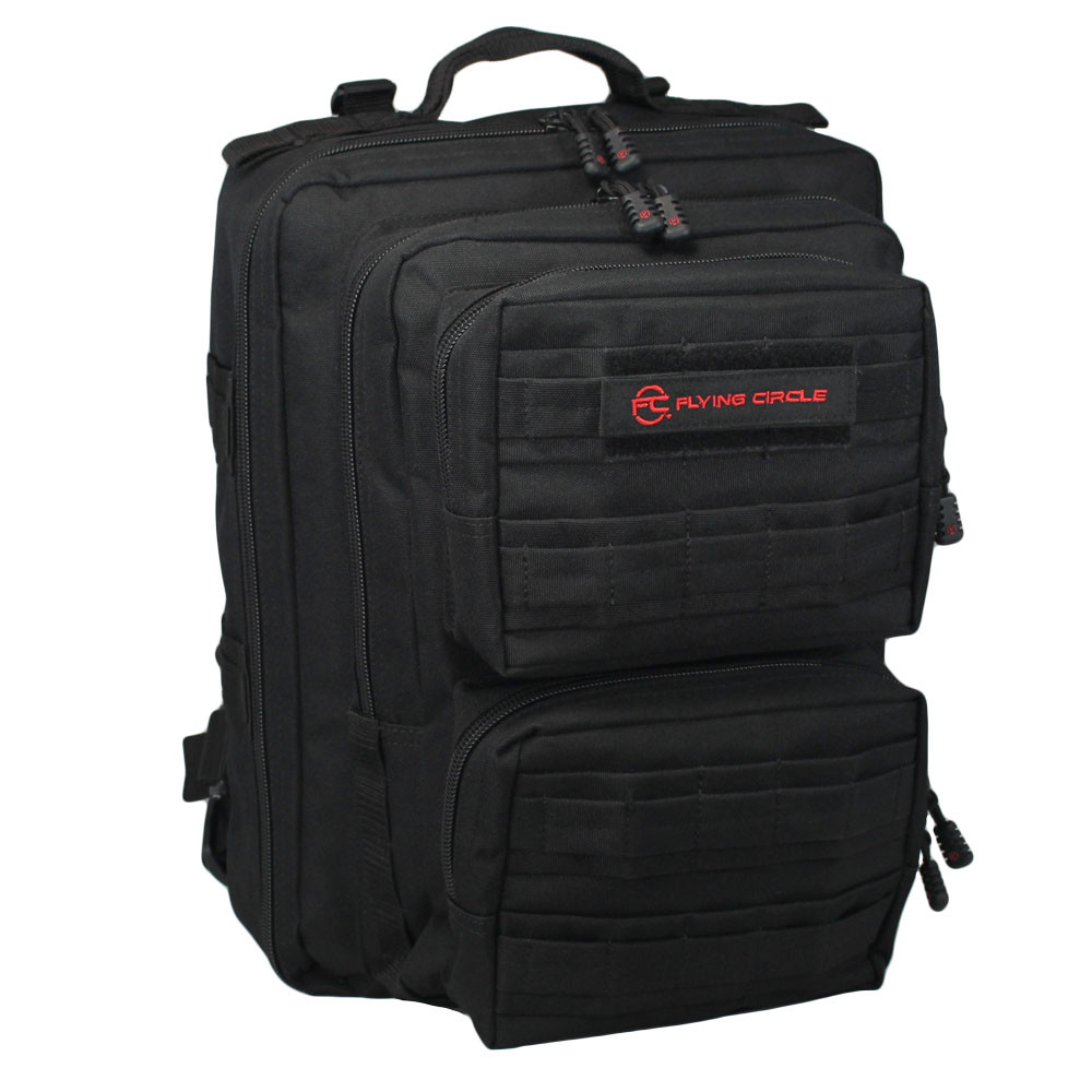 Front of black Midland Military Backpack with two small pockets, MOLLE webbing wrapped in fabric, Flying Circle patch with red letters on top pocket, and top grab handle.