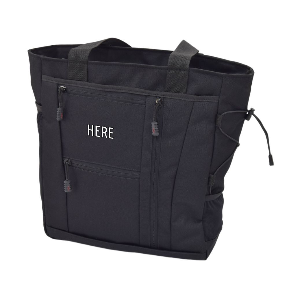 Monogram placement shown on top front pocket on Deluxe Travel Tote in Black.