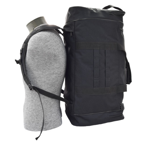 Easily transforms from a duffel to a backpack with stow-away straps stored in bottom pocket, backpack shown on mannequin from side angle.