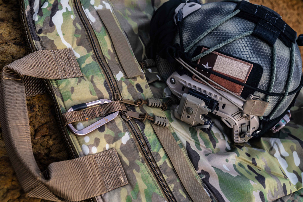 Deluxe Helmet Bag in MultCam® with helmet on top.