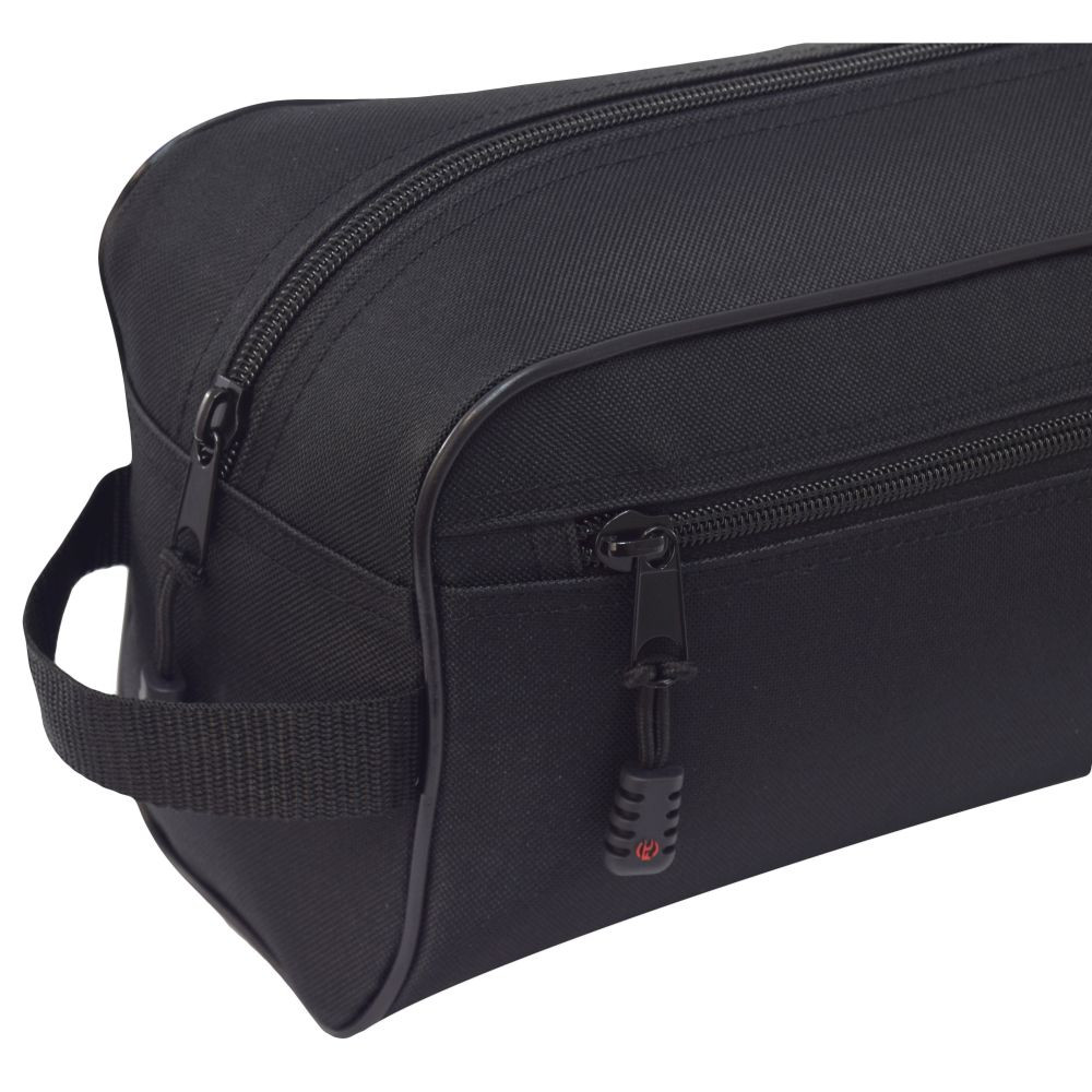 Close up of main and side zippered compartments and handle.